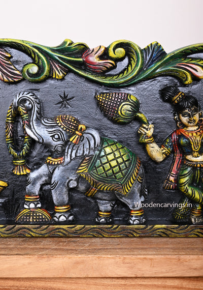 Gaja Lakshmi With Sevagar Ladies Standing Voilet Coloured Hamsa Horizontal Multicoloured Wooden Wall Panel 49"