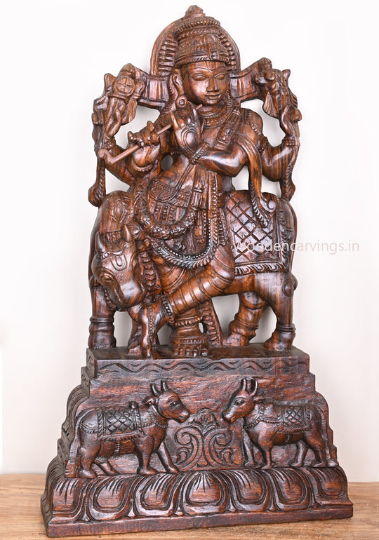 lord krishna wooden statue