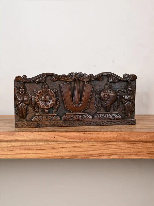 Wooden wall panel of Vishnu's symbol