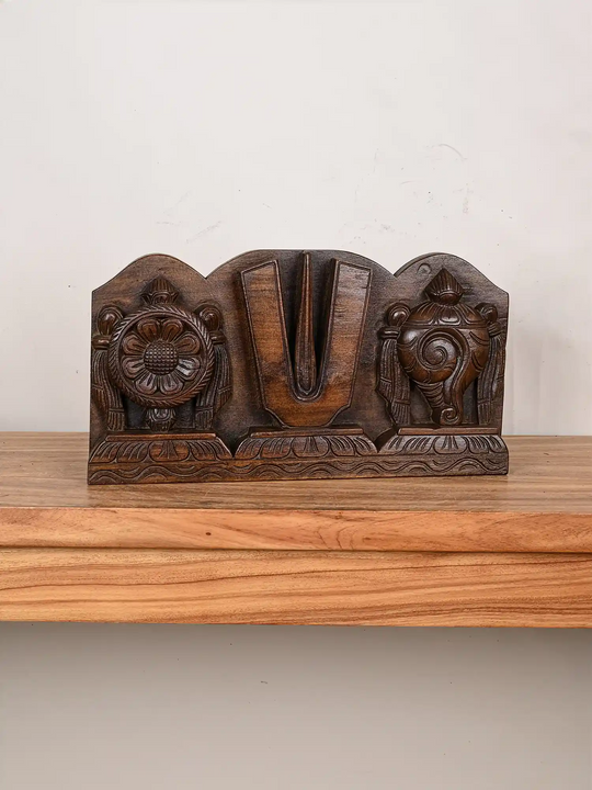 Wooden symbols of Vishnu wall panel