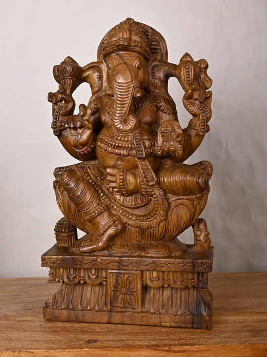 Traditional Ganapathi wood artwork for devotional spaces