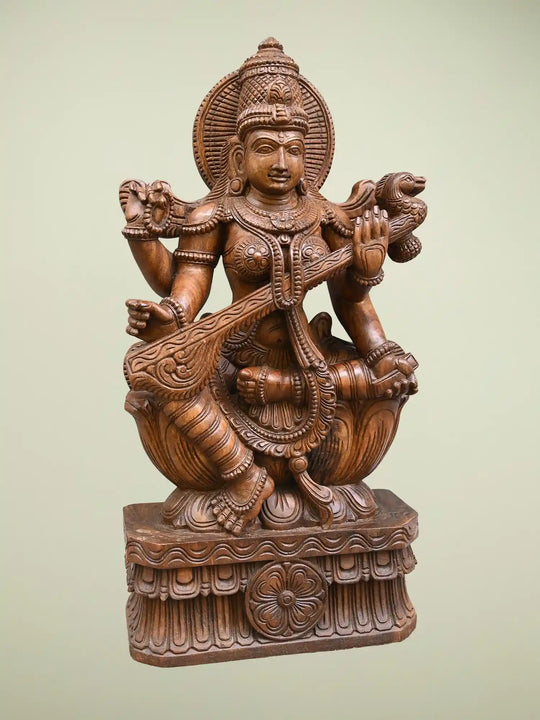 Wooden statue of Goddess Saraswati