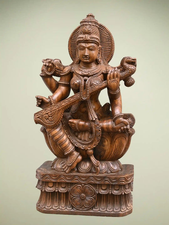Wooden statue of Goddess Saraswati