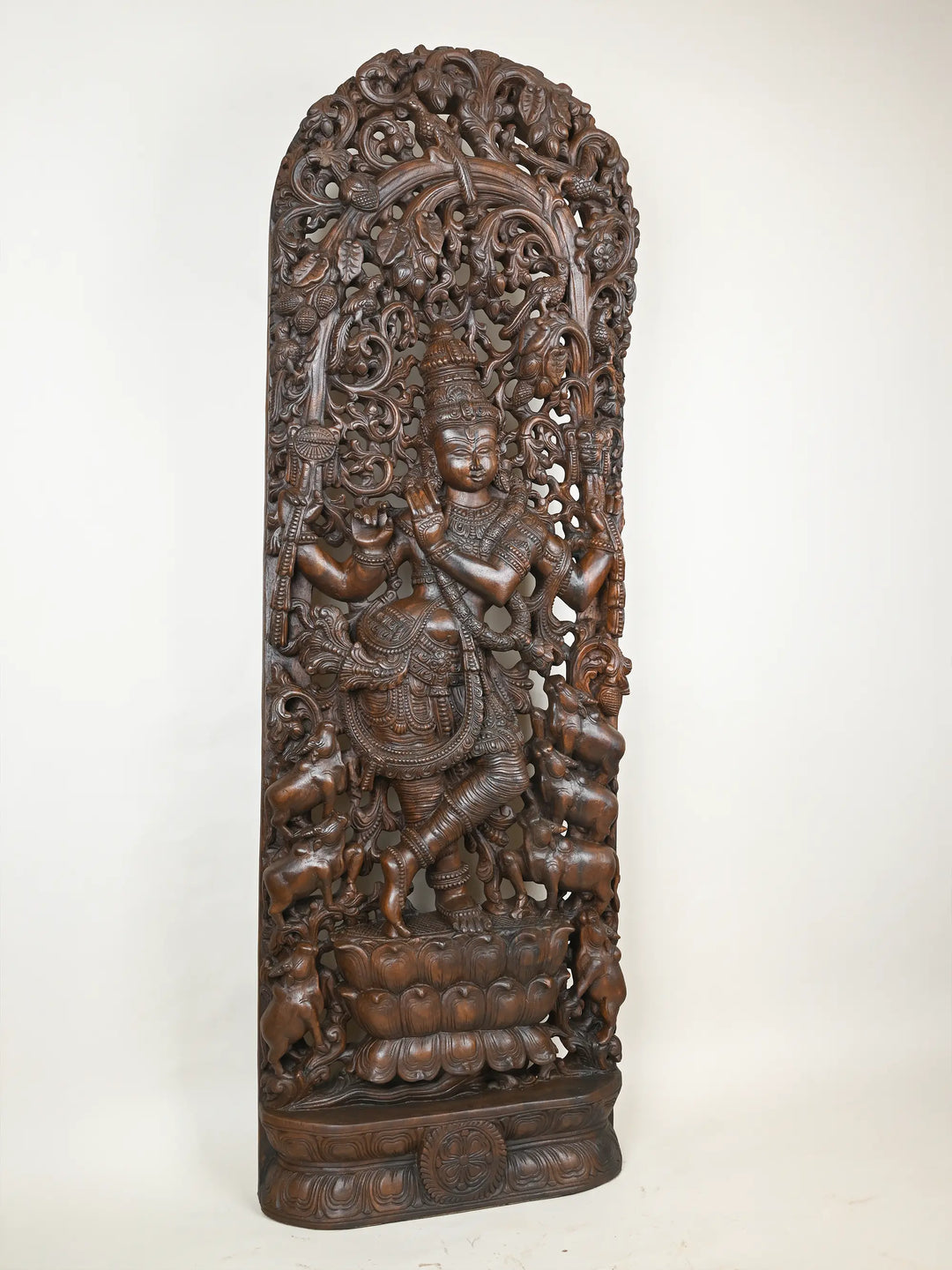 wooden krishna statue