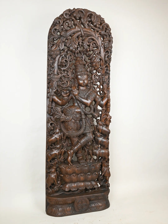 wooden krishna statue