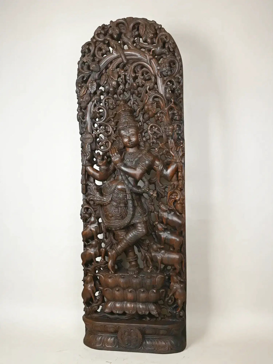 wooden krishna statue