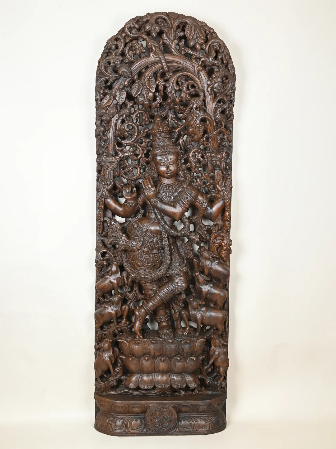wooden krishna statue