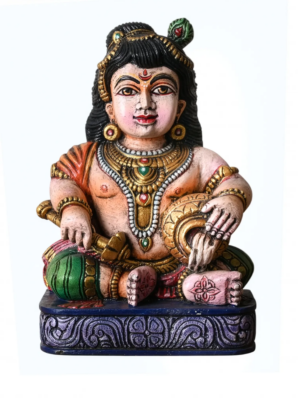 Handcrafted seated multi coloured Krishna wooden statue for home decor 

