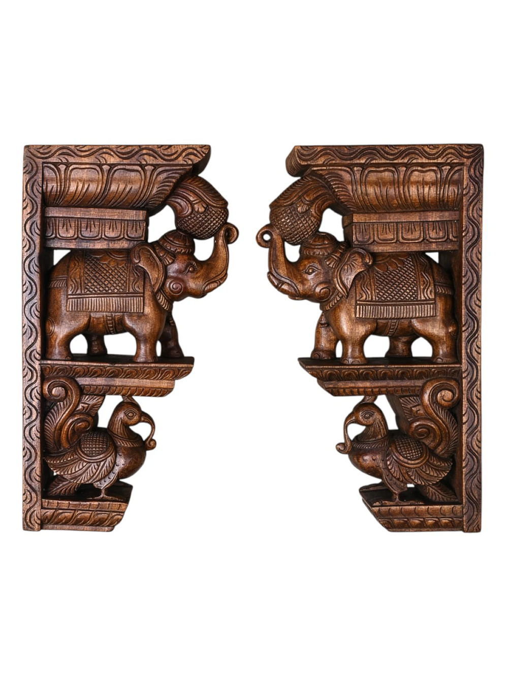 wooden brackets of elephant and hamsa