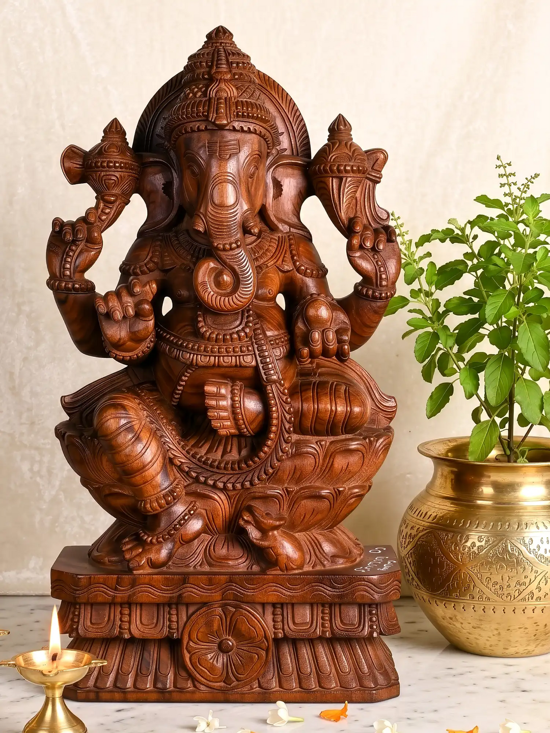 Handcrafted wooden Ganesha sculpture for home decor