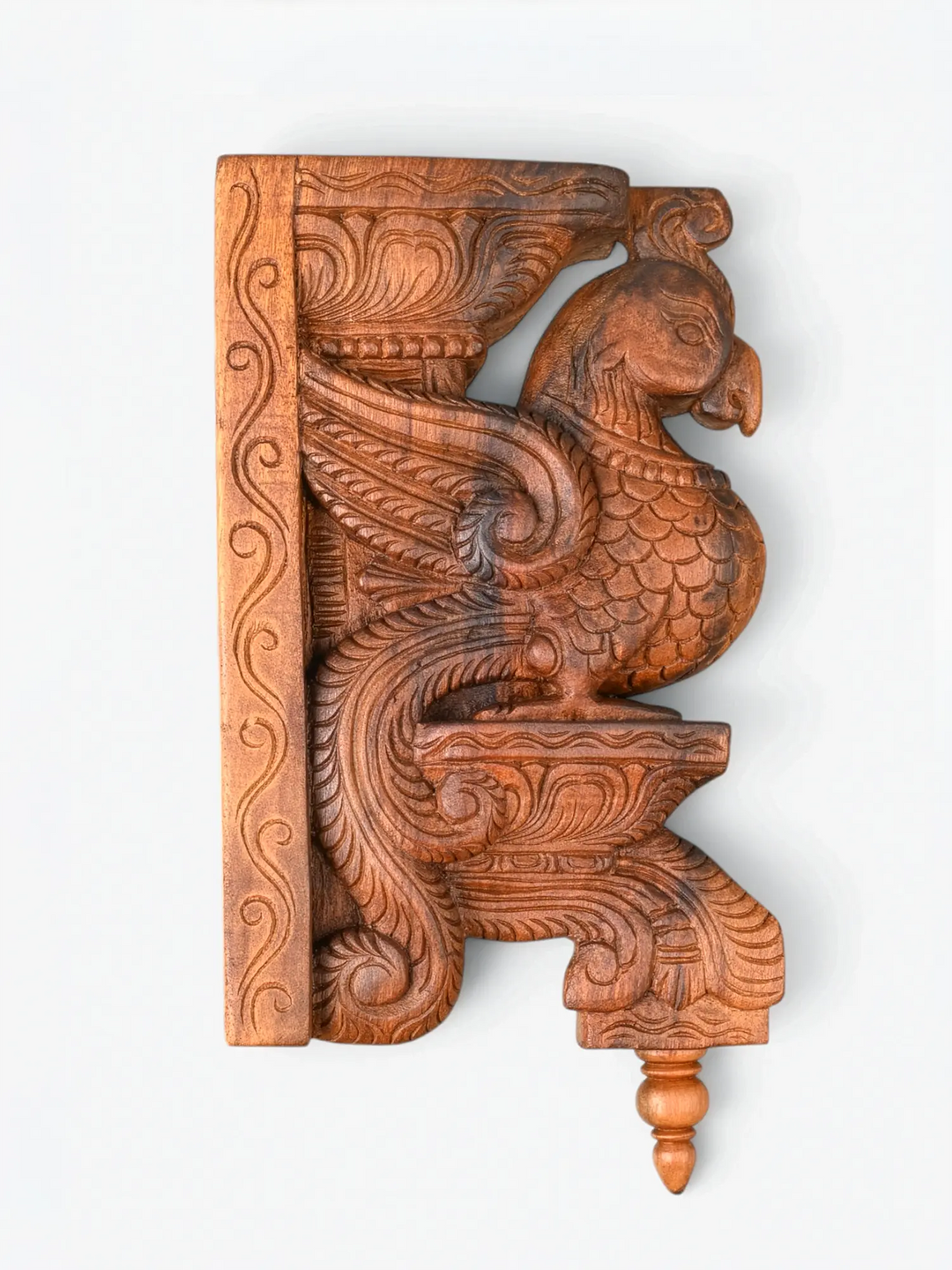 Wall-mounted carved wooden peacock decor pieces