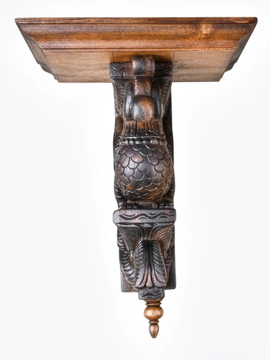Wooden wall bracket featuring detailed parrot and floral carvings