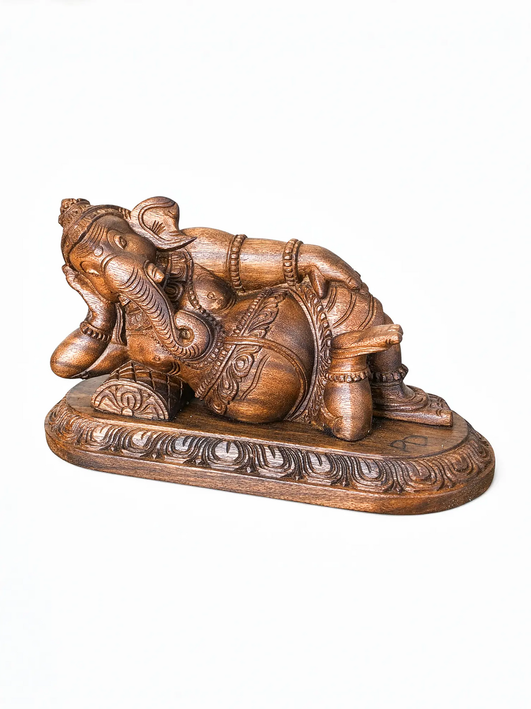 Handcrafted reclining wooden Ganesha idol for home decor