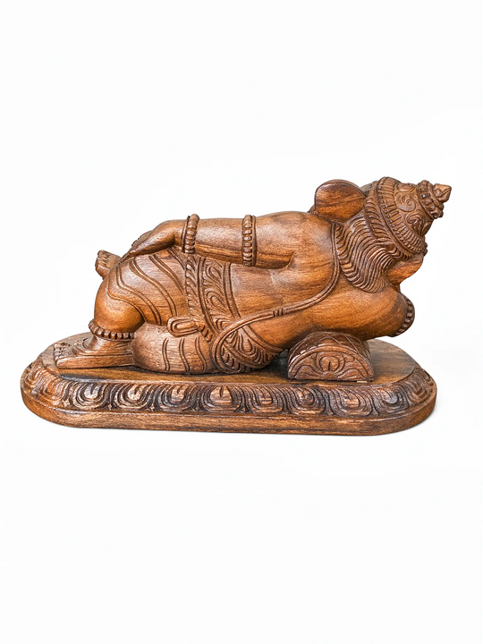 Elegant reclining Ganesha wood carving for home