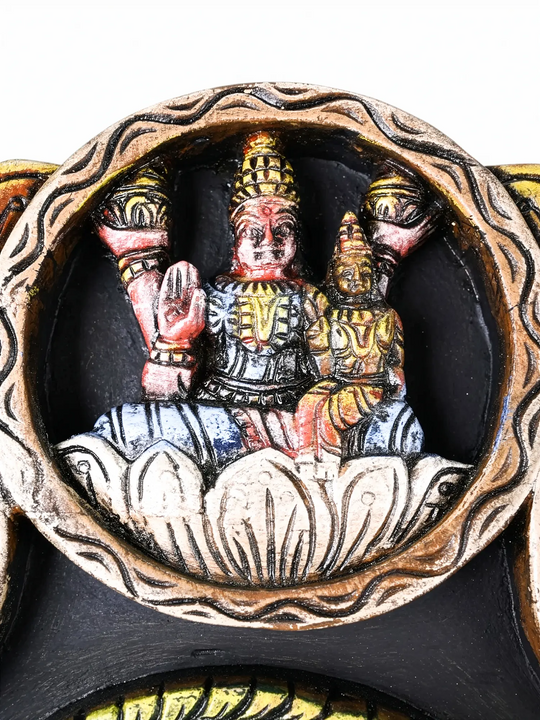 Traditional Ashta Lakshmi wooden wall hanging for pooja room décor.