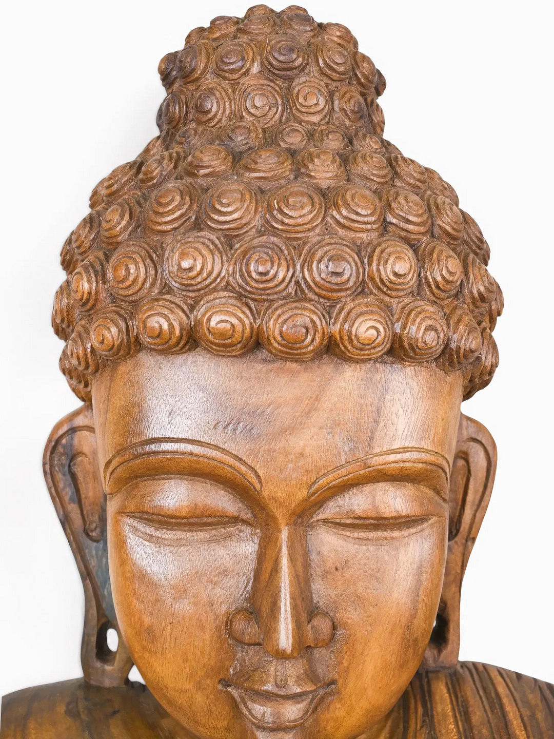 Luxury handcrafted Buddha wood carving for modern home interiors.