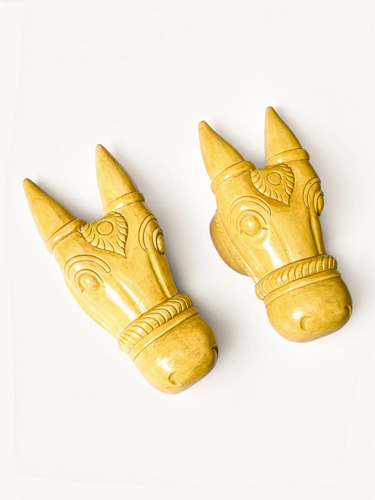 Traditional wooden bull head sculpture bracket for home and temple decor.