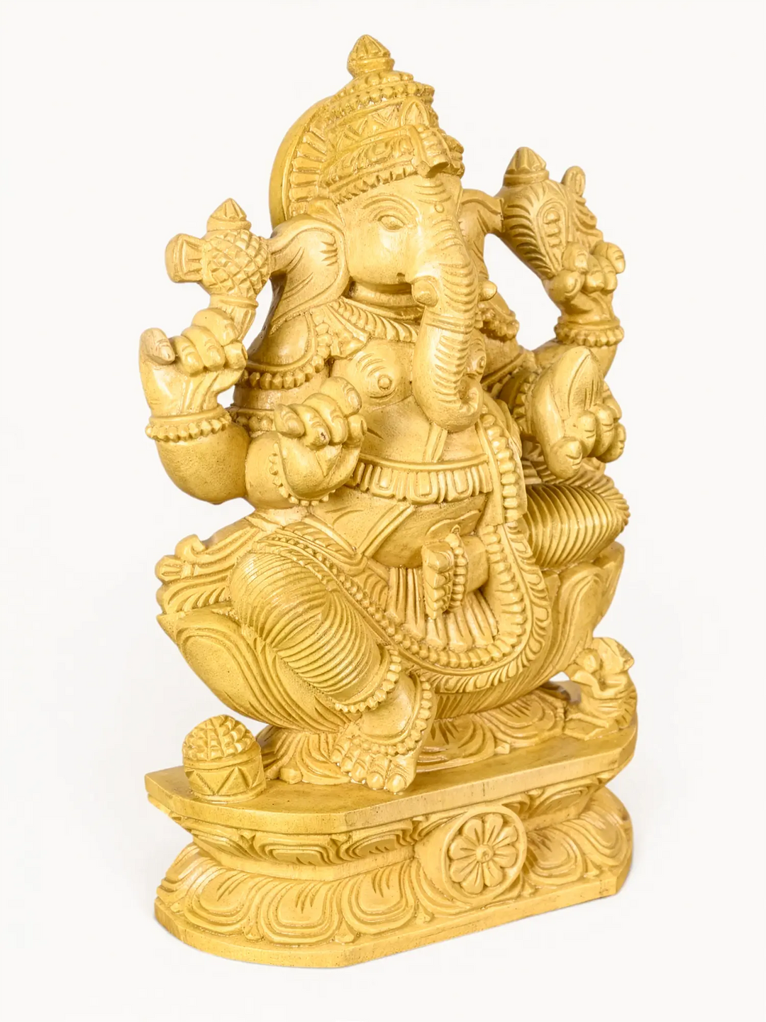 Handmade wooden Ganesha idol with intricate carving for elegant home decoration.