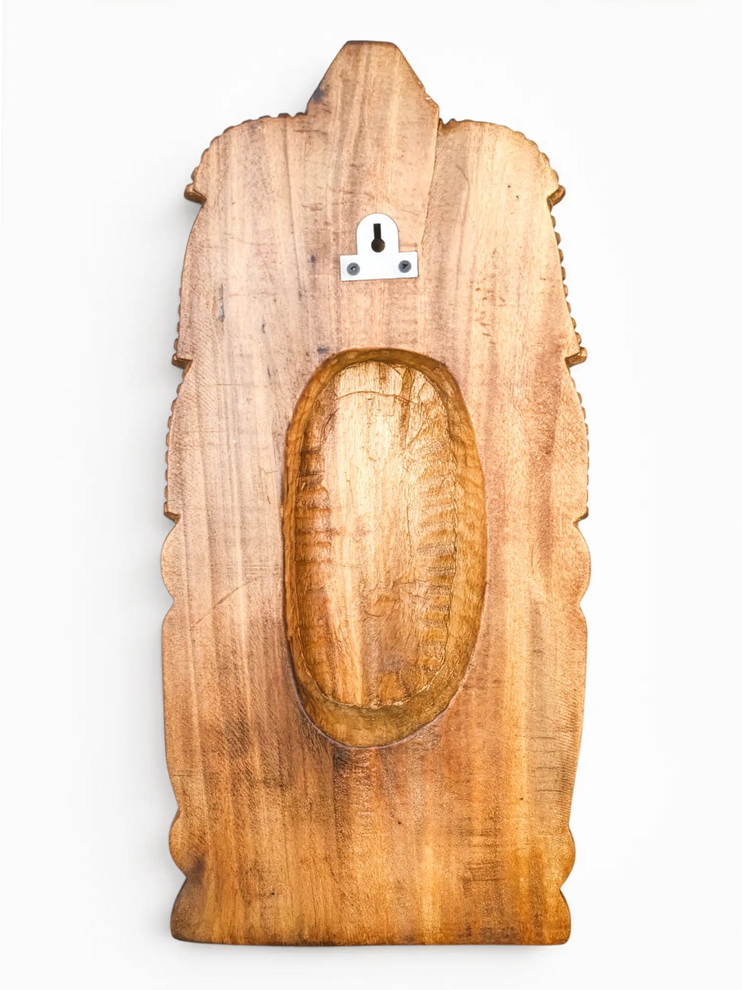 Traditional wooden Vishnu face sculpture carved by Indian artisans for pooja room decoration.