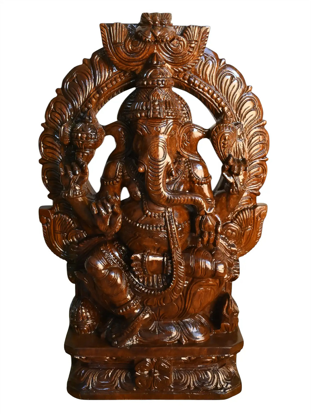 Handcrafted wooden Prabhavali Ganesha idol with intricate temple-style carvings