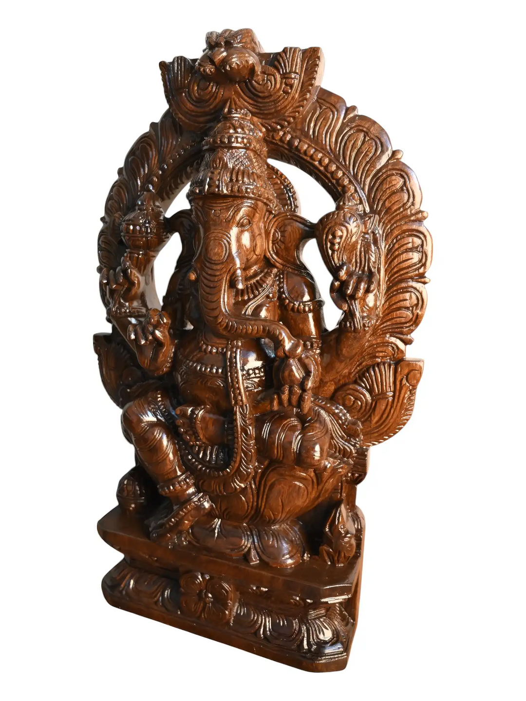 Traditional Hindu wooden Ganesh sculpture with carved arch design