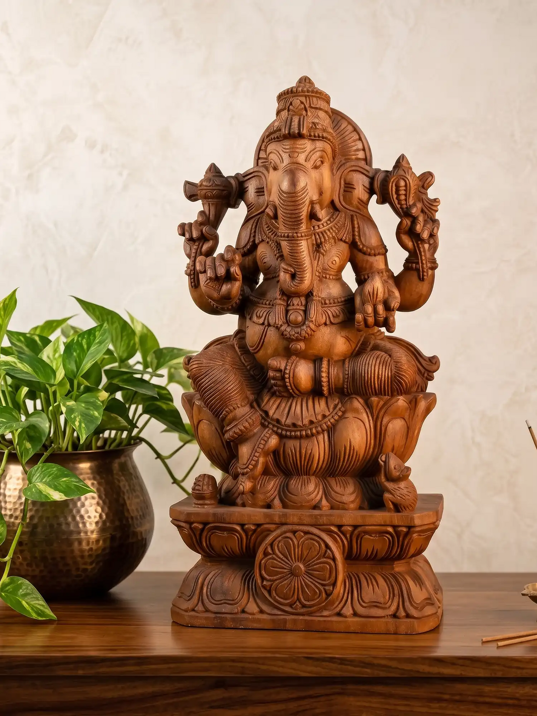 Handcrafted wooden Ganesha panel with intricate traditional Indian carvings