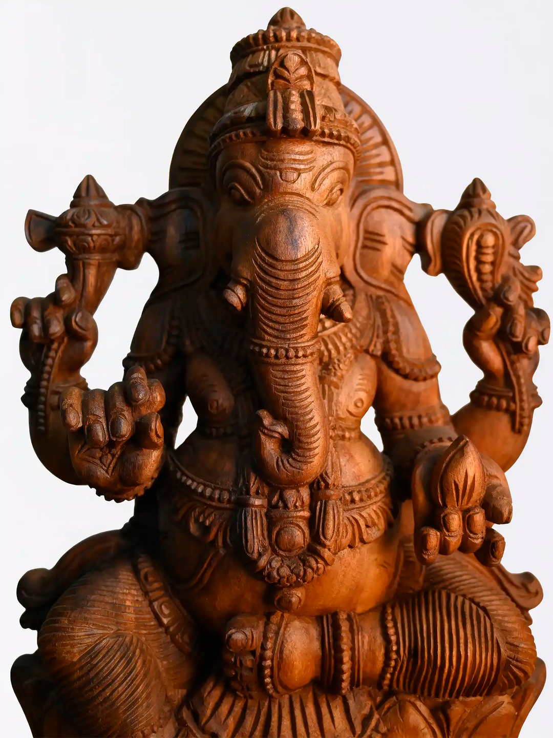 Decorative wooden Ganesh wall art for traditional Indian interiors