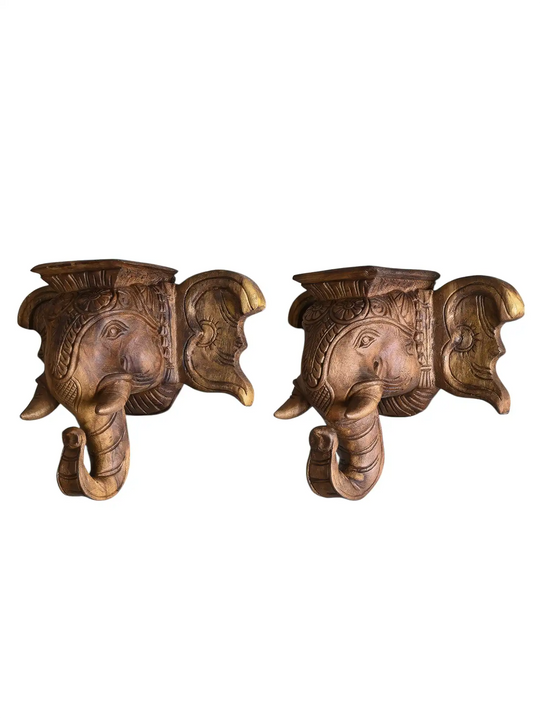 Traditional wooden elephant heads with stand