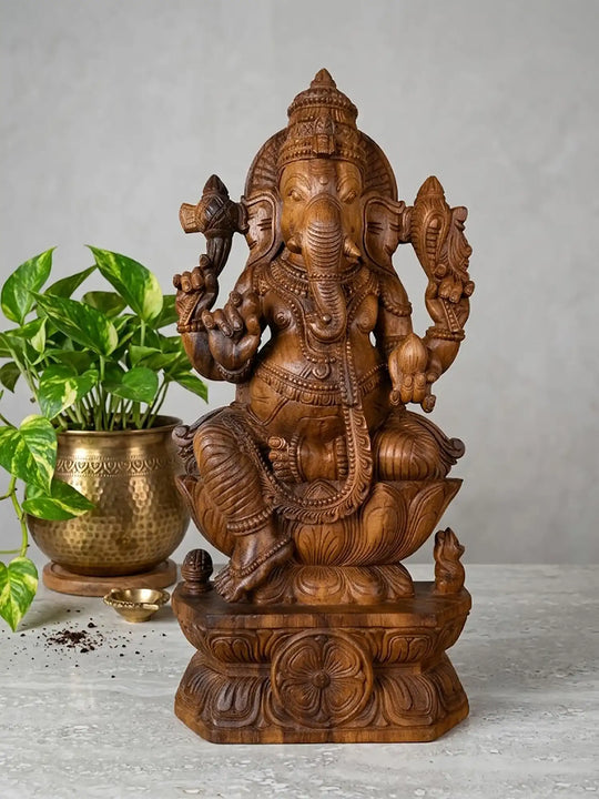 Handcrafted Ganesha wood sculpture for spiritual decor
