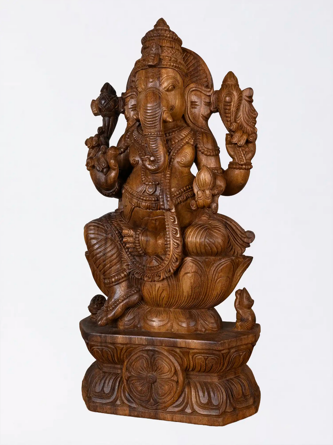 Traditional Ganapathi wooden artwork for pooja room
Detailed wooden Ganesha carving for temple decor