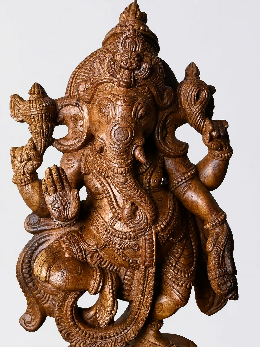 Hand carved Dancing Ganapathi on lotus wooden sculpture