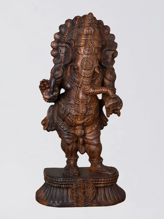 Handcrafted standing wooden Ganesh idol with antique finish