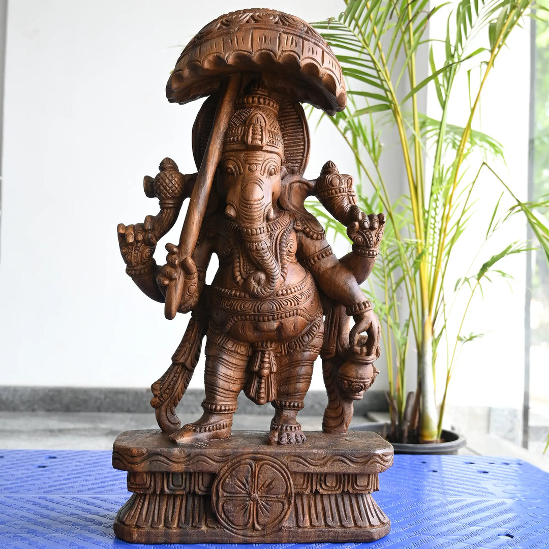 Wooden umbrella Ganesh idol for traditional home decor