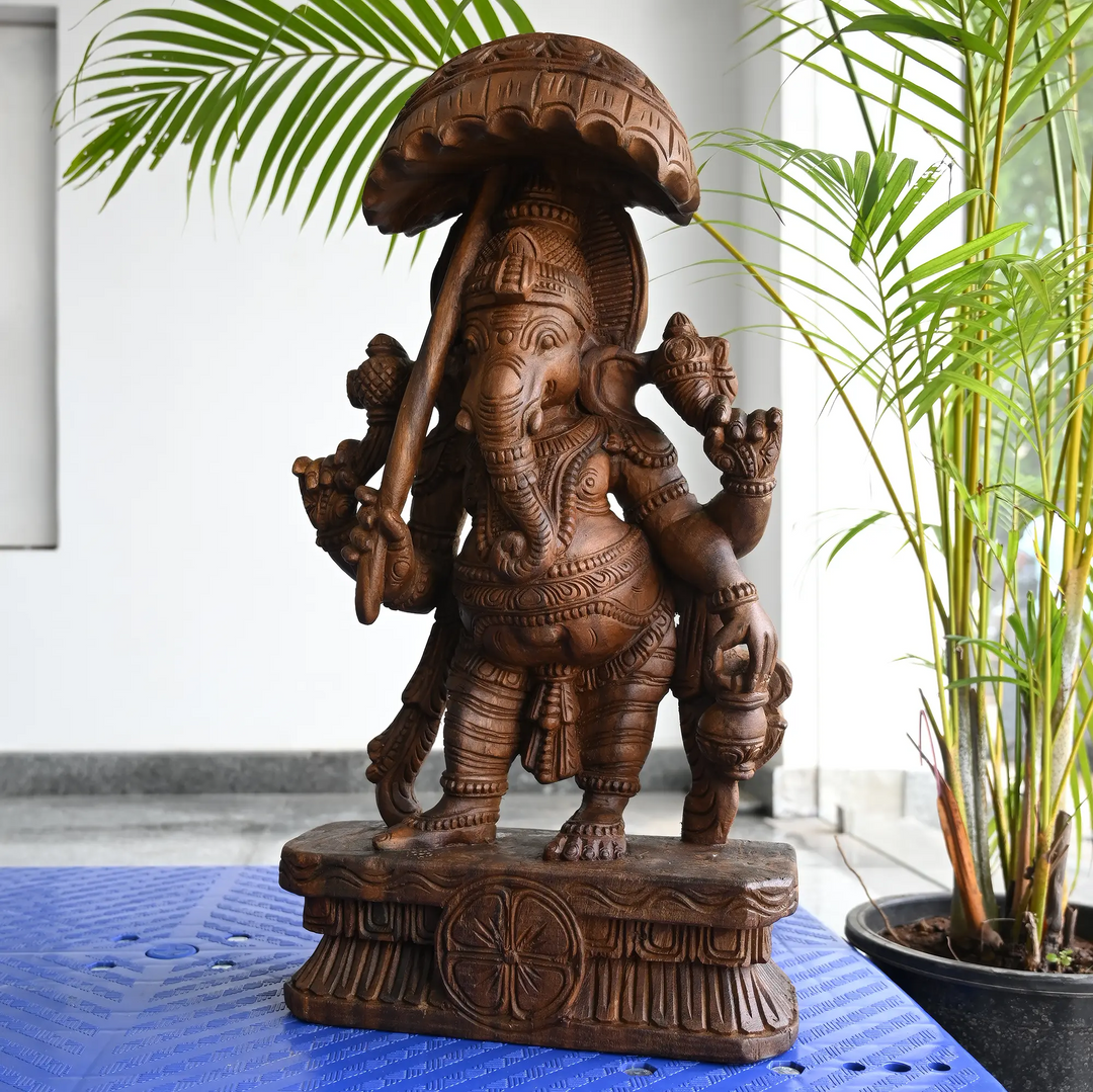 Wooden umbrella Ganesha idol for spiritual home decor