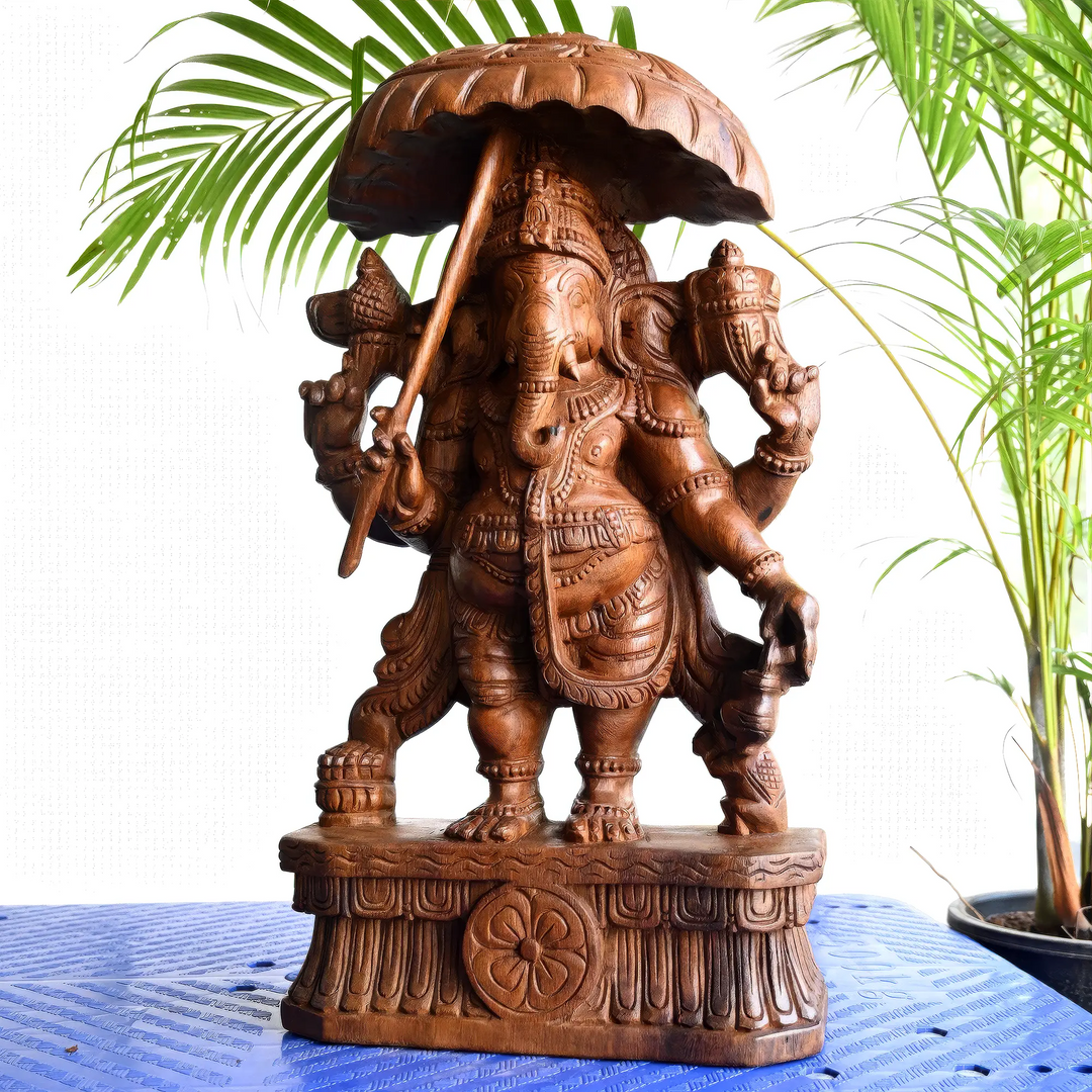 Decorative Umbrella Ganapathi statue by Sengottuvel Wood Carvings
