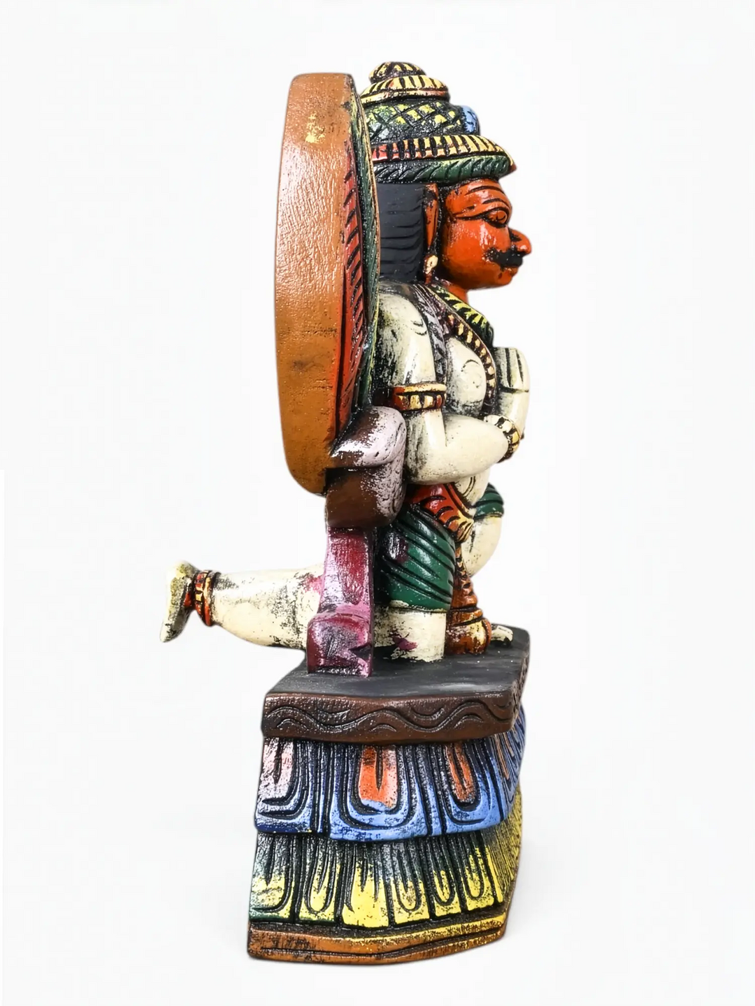 Handmade Garuda wood carving in Namaste pose with detailed craftsmanship.