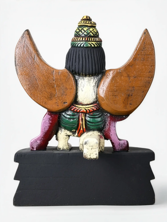 Traditional wooden Garuda sculpture for spiritual home decor.