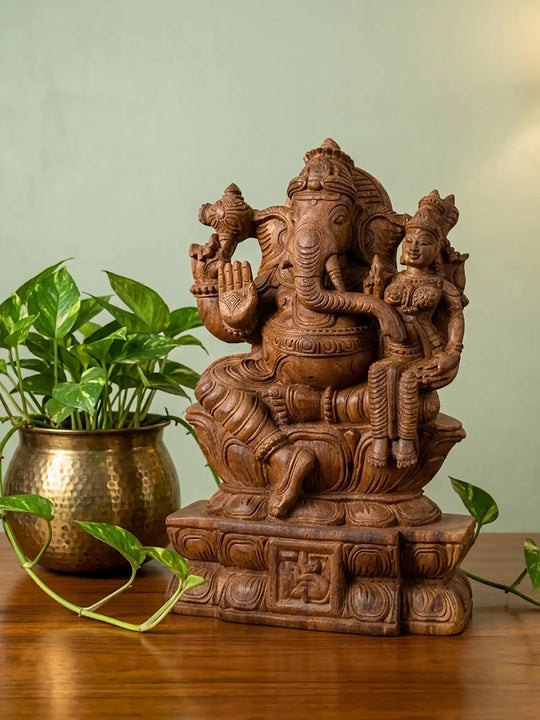 Vallabha Ganapati wood carving displayed as a sacred decorative idol
