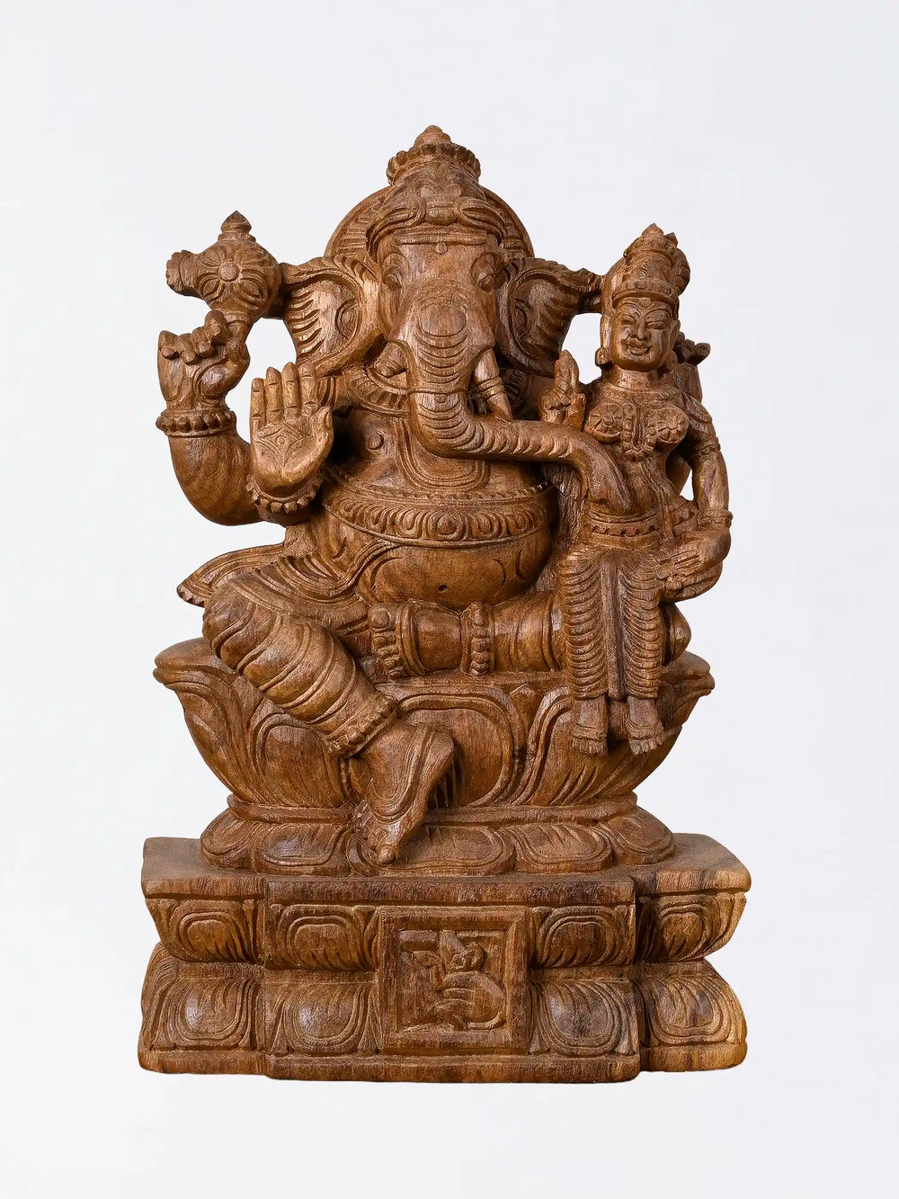 Indian handcrafted wooden Ganesha idol with intricate carving
