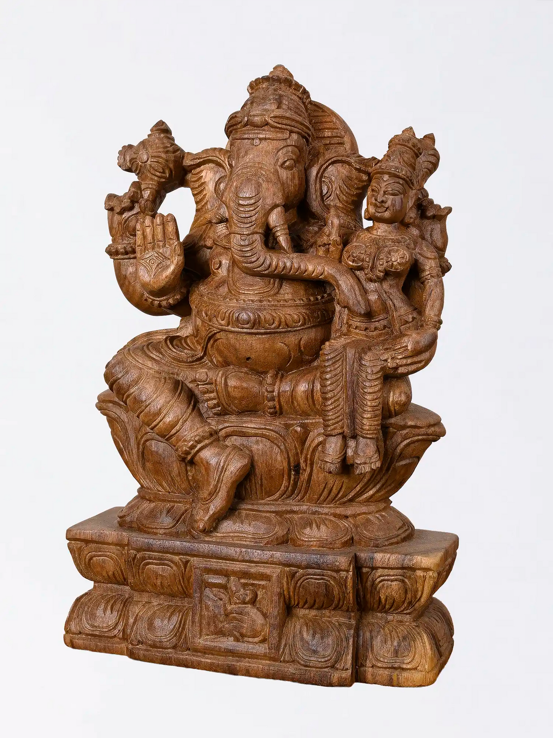 Hand carved wooden Ganapati idol in traditional South Indian style