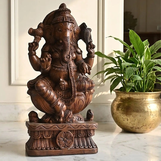 Lord Ganesha wooden statue for pooja room