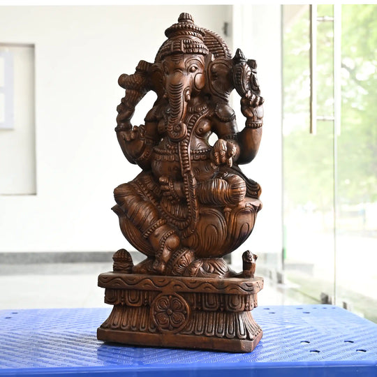 Handcrafted Ganesha wood carving statue