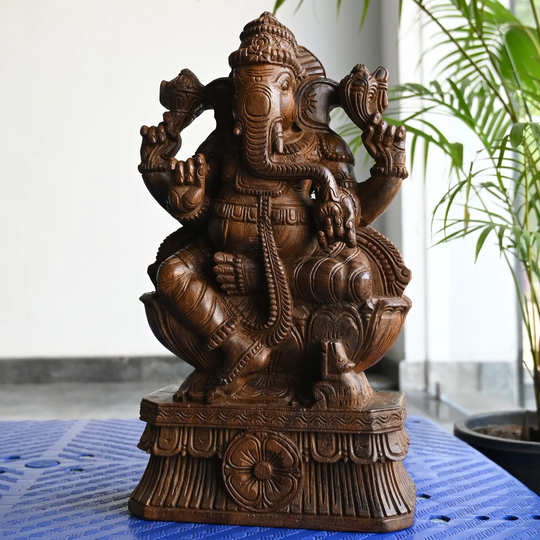 Wooden Ganesh idol with traditional handcrafted carving
