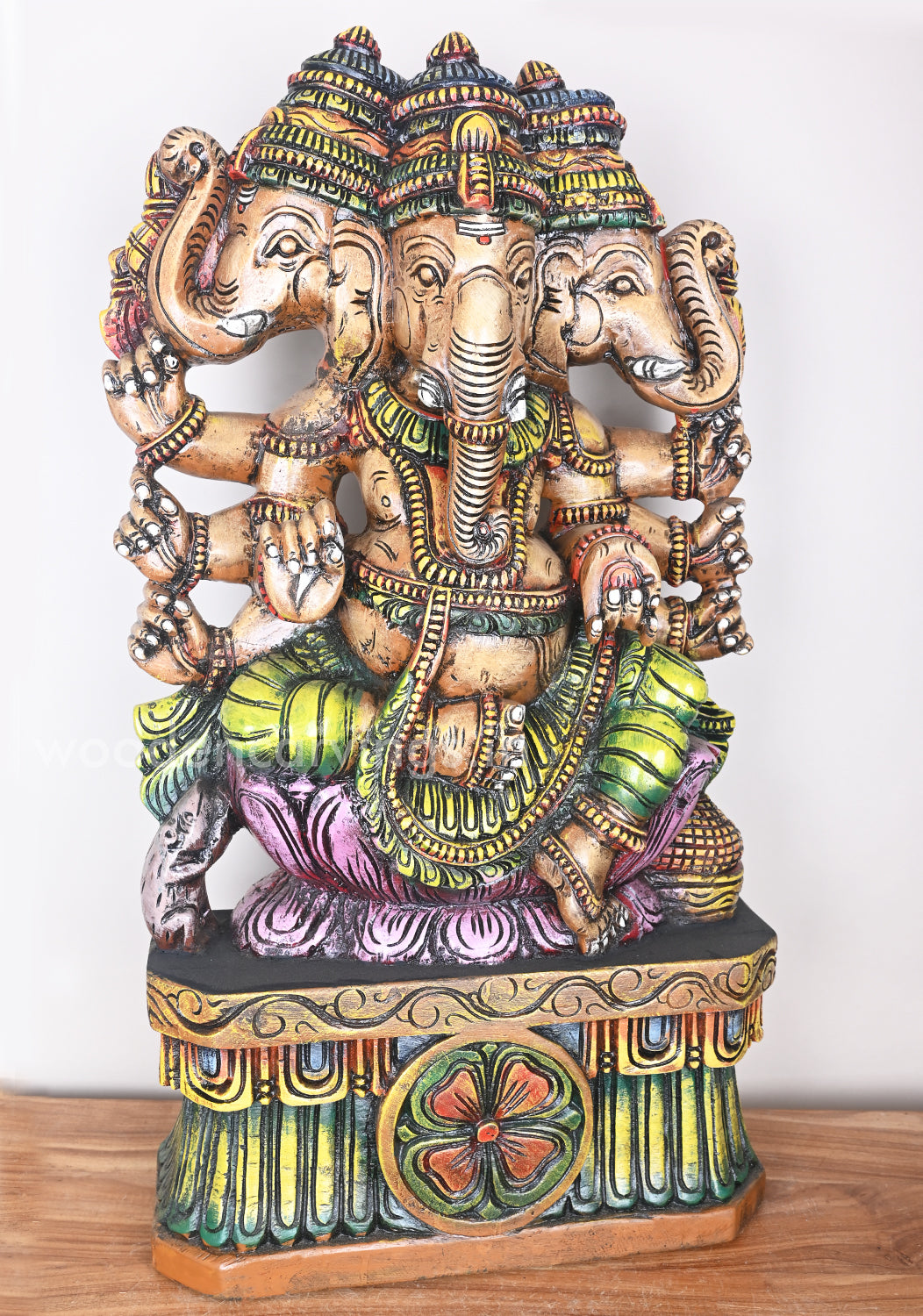 Showpiece of Eight Hand Three Head Ganesha on Pink Lotus Wooden Sculpture 33"
