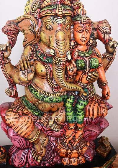 Ganesha Seated on Dark Pink Lotus With His Consort Wooden Sculpture 35"