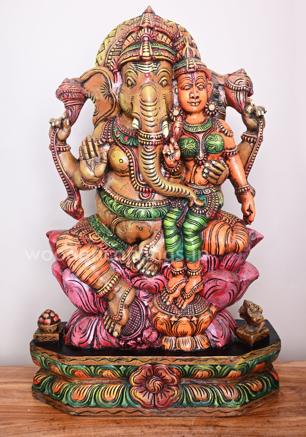 Ganesha Seated on Dark Pink Lotus With His Consort Wooden Sculpture 35"