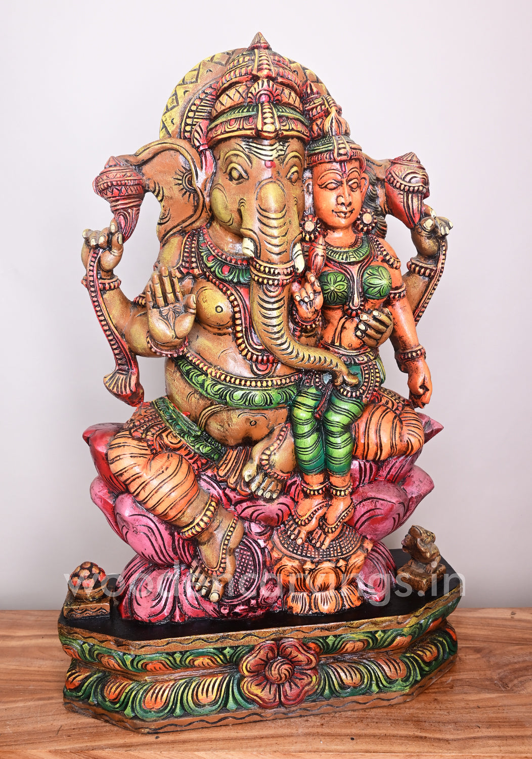 Ganesha Seated on Dark Pink Lotus With His Consort Wooden Sculpture 35"
