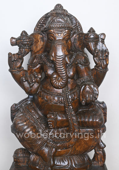 Wax Brown Polished Ganesha on Lotus and Holding Mothak Wooden Sculpture 25"
