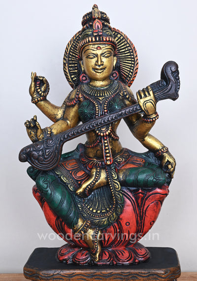Smiling Goddess Saraswathi Seated on Red Lotus Beautiful Wooden Sculpture 24"