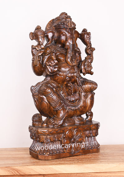 Preety Polished Ganapathi Simply Seated on Auspicious Lotus Wooden Handmade Sculpture 24"